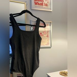 Grey body suit